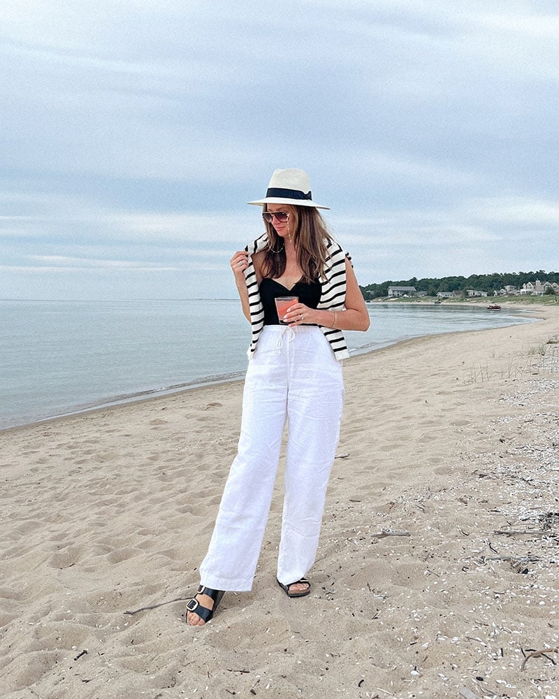 White wide-leg linen pants with a black top and striped cardigan White wide-leg linen pants with a black top and striped cardigan — Linen Pants Outfits