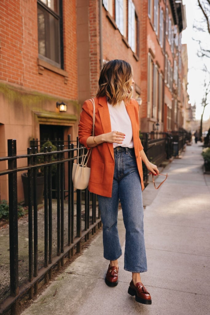 Orange Blazer Wide Leg Jeans With Brown Loafers, Beige Bucket Bag Orange Blazer Wide Leg Jeans With Brown Loafers, Beige Bucket Bag — Loafer Outfits