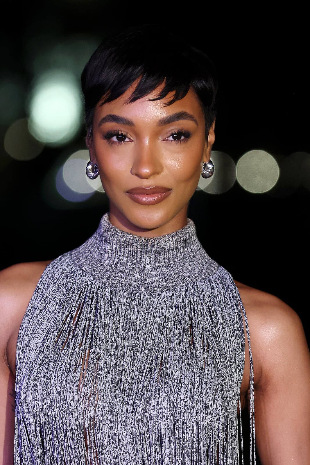 Slicked Back Black Pixie With Short Fringe Slicked Back Black Pixie With Short Fringe — Long Pixie