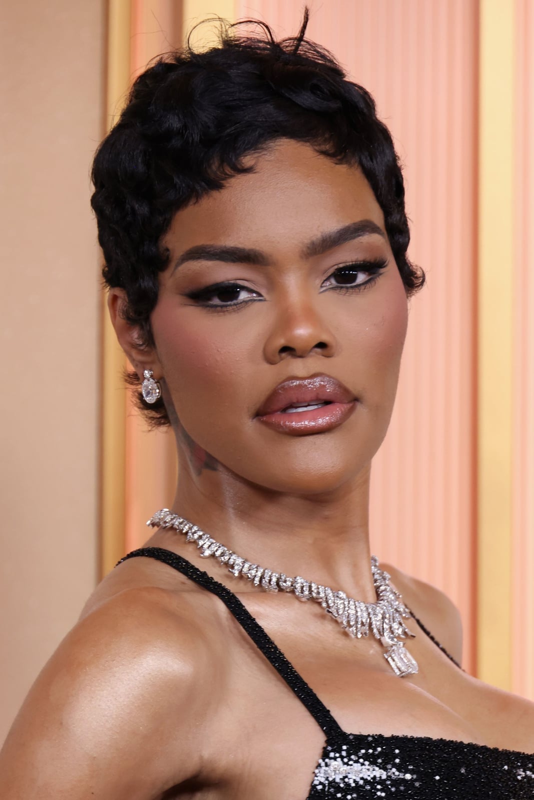 Black Pixie With Wispy Side Bangs, Ear Black Pixie With Wispy Side Bangs, Ear — Long Pixie