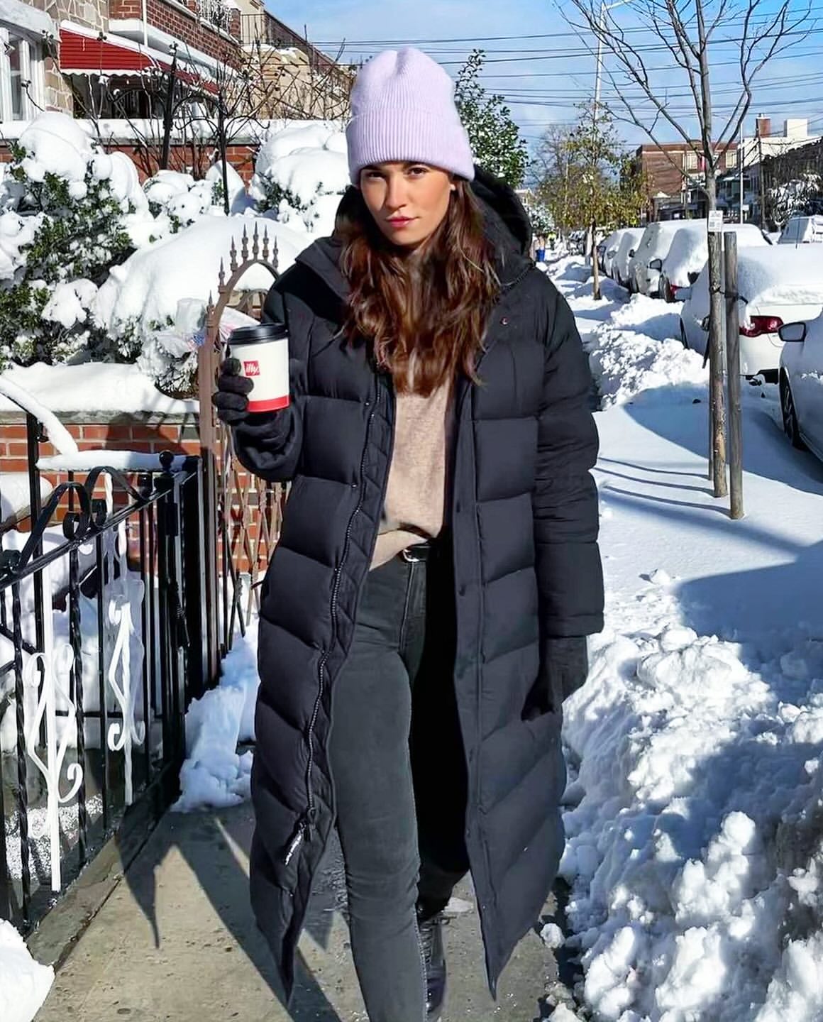Long Puffer Coat With Knit Sweater And Denim