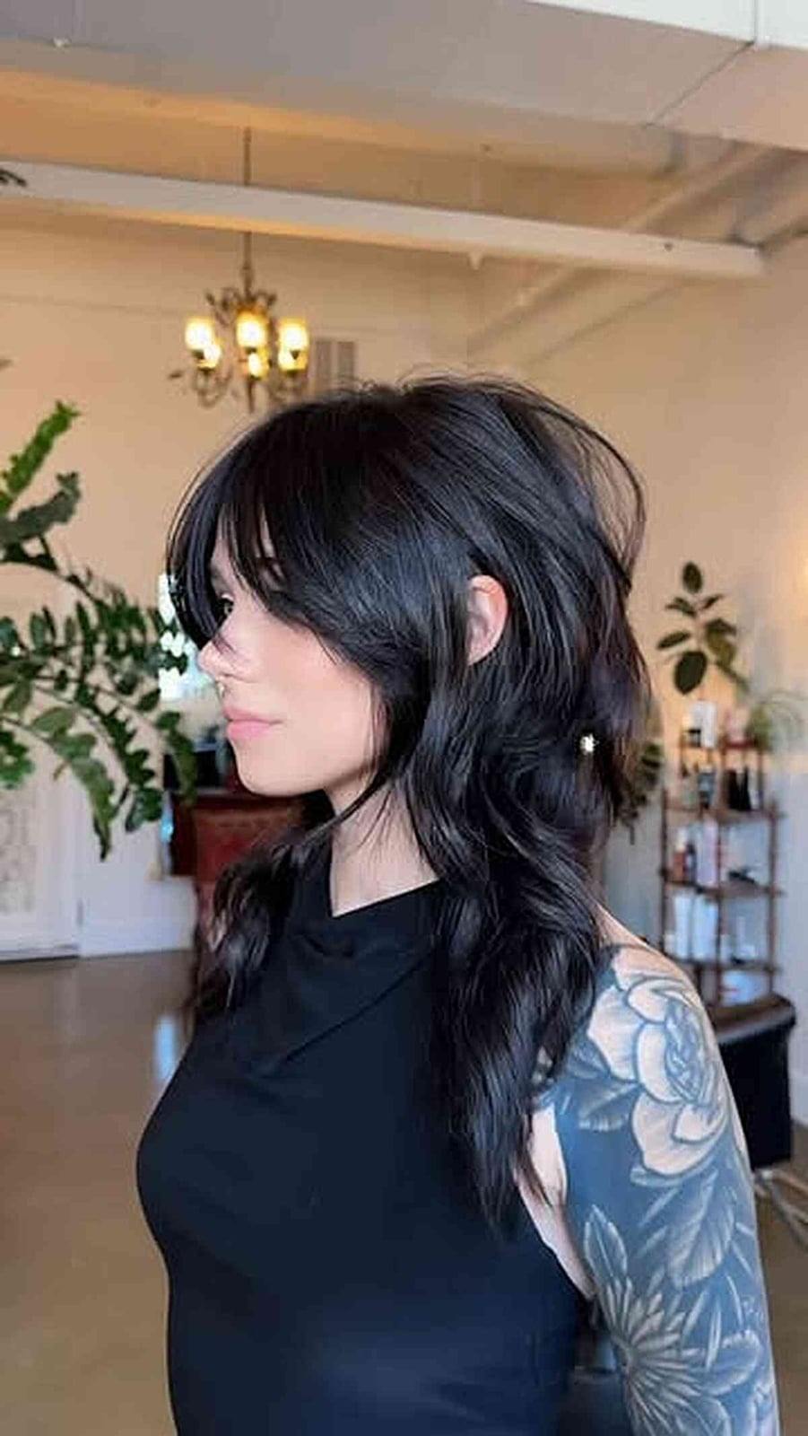 Shoulder Length Black Shag With Curtain Bangs Shoulder Length Black Shag With Curtain Bangs — Long Shag