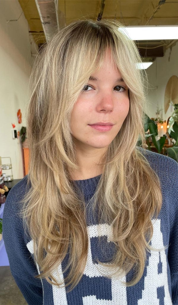 Mid-Back Blonde Shag With Feathered Layers, Curtain Bangs Mid-Back Blonde Shag With Feathered Layers, Curtain Bangs — Long Shag