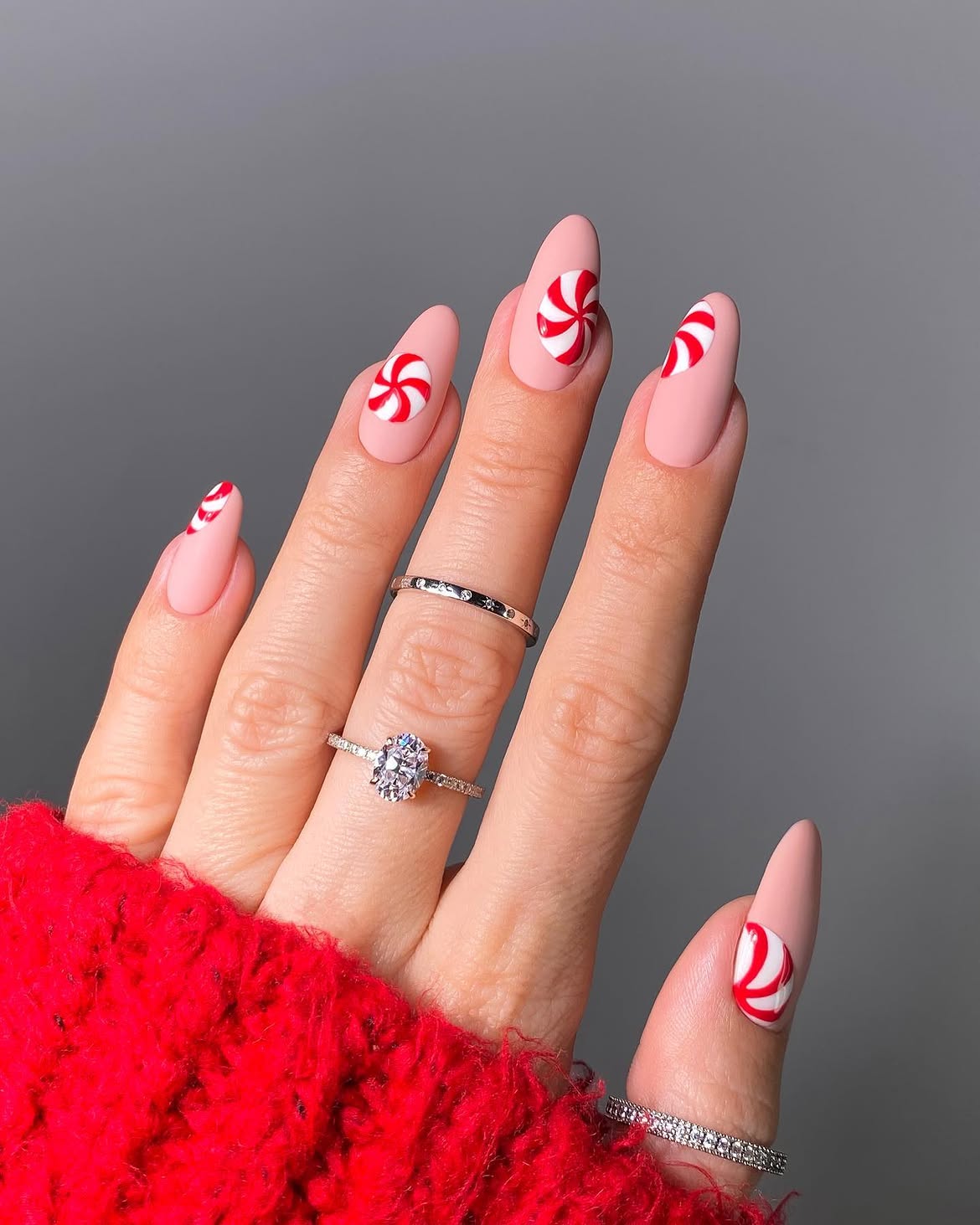 Matte Candy Cane Swirl Almond Nails