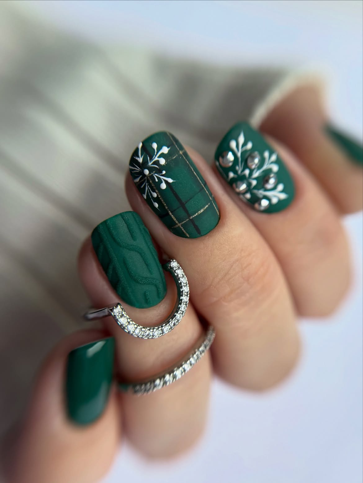 Matte Forest Green Winter Nail Art with Plaid and Sweater Knit Texture