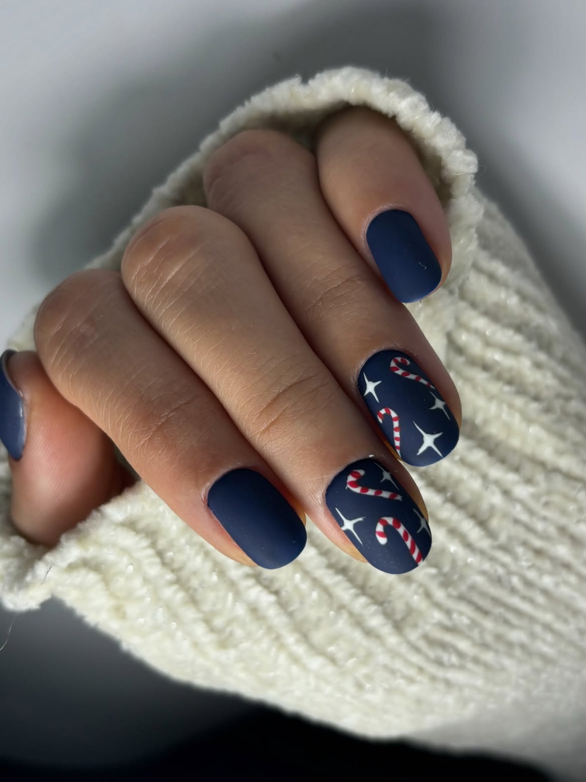 Matte Navy Candy Cane Swirl Nail Art