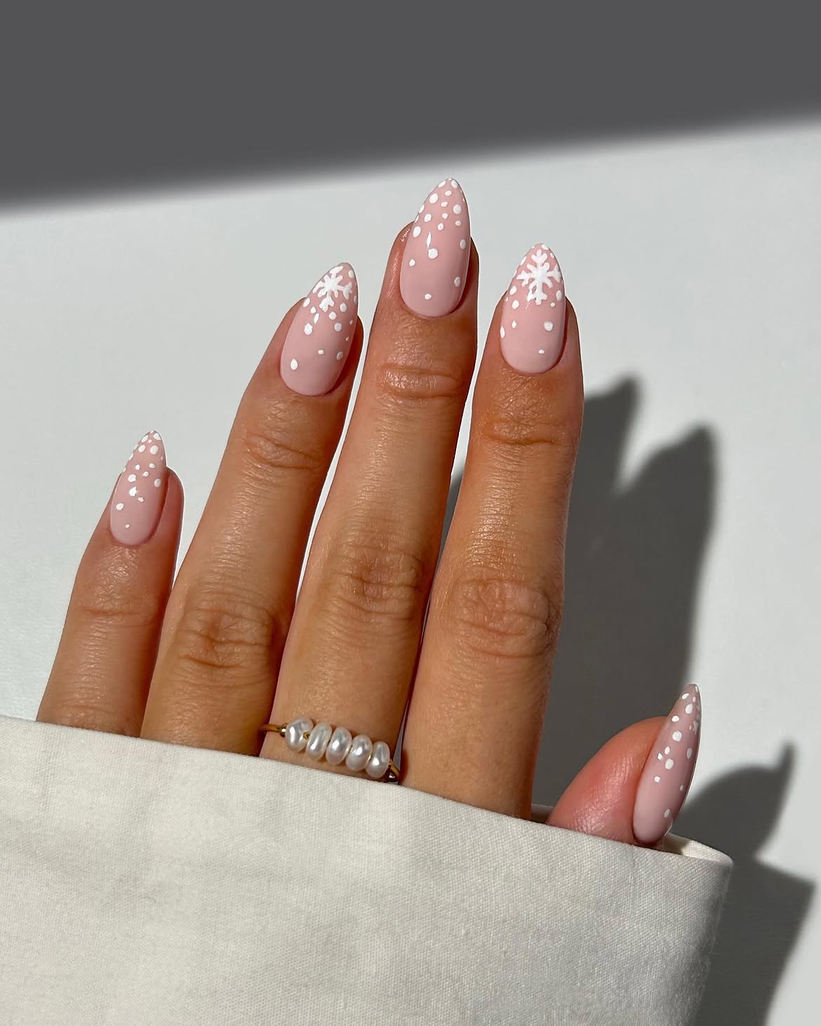 Matte Pink Snowflake Almond Nails