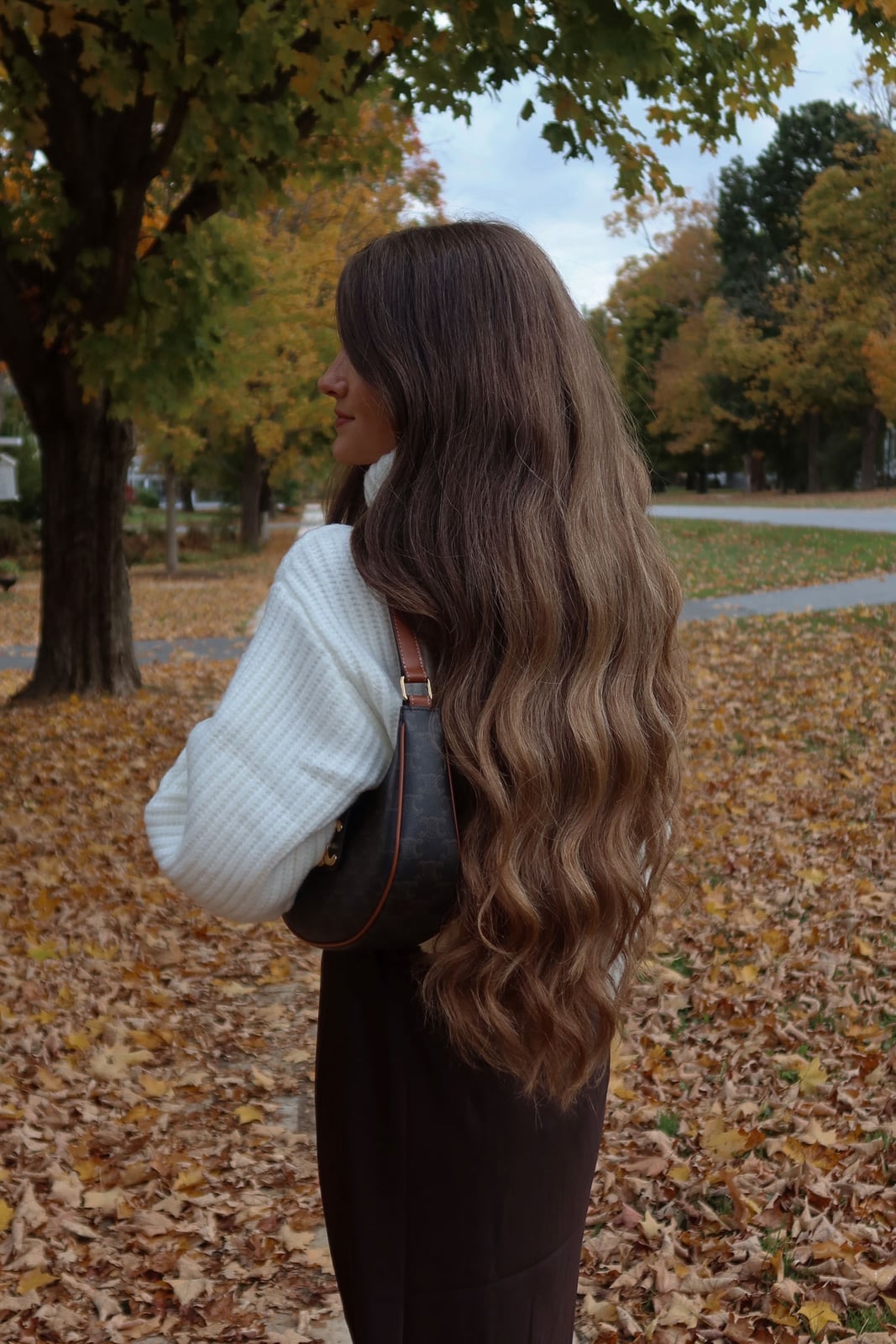 A Brown Satin Maxi Skirt With A Knit Turtleneck A Brown Satin Maxi Skirt With A Knit Turtleneck — Maxi Skirt Outfits
