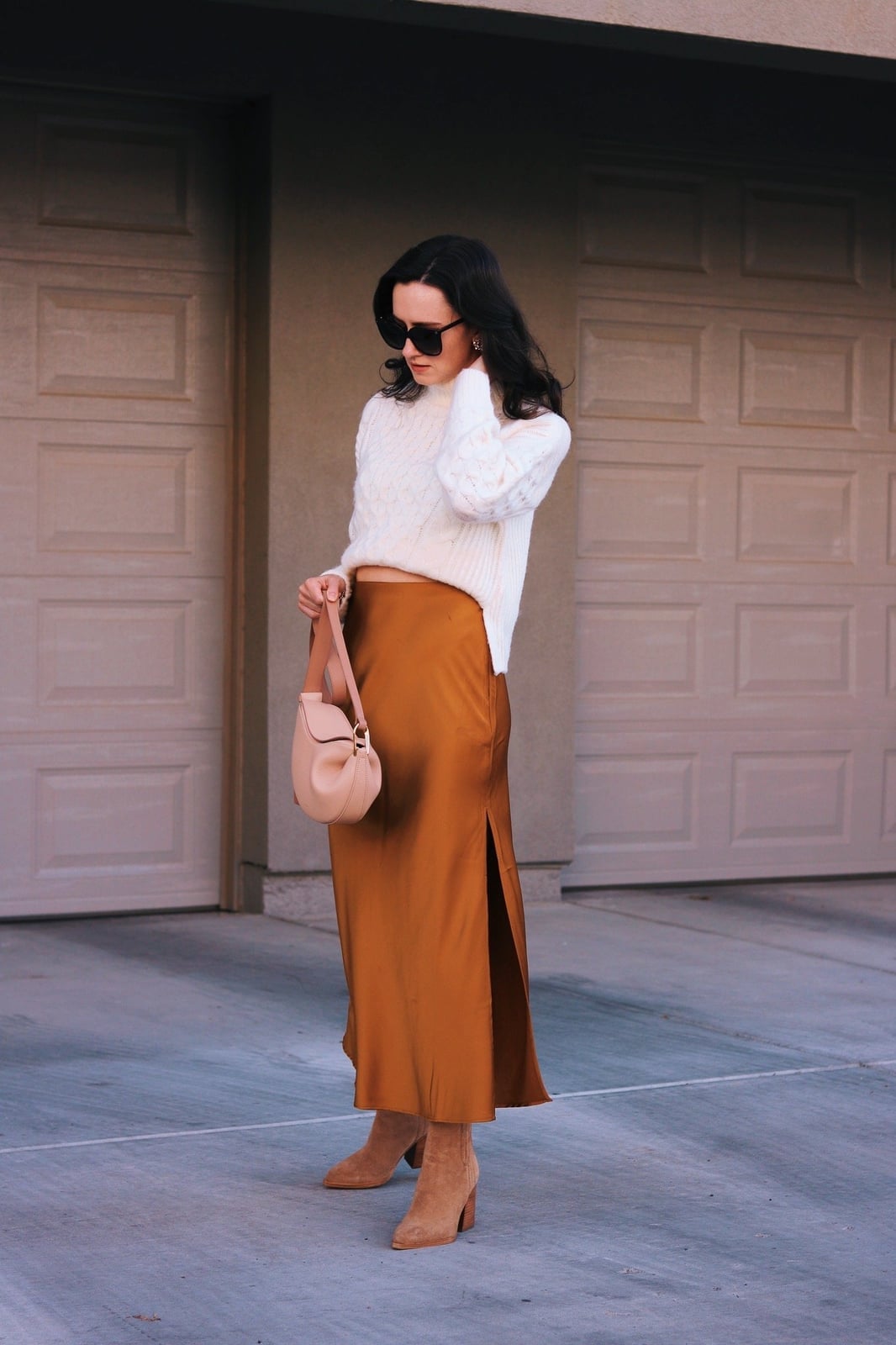 A Shimmering Bronze Satin Maxi Skirt With A Cable Knit Sweater A Shimmering Bronze Satin Maxi Skirt With A Cable Knit Sweater — Maxi Skirt Outfits