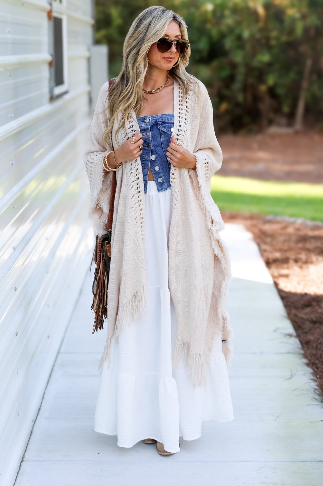 A White Tiered Maxi Skirt With A Denim Vest And Cardigan A White Tiered Maxi Skirt With A Denim Vest And Cardigan — Maxi Skirt Outfits