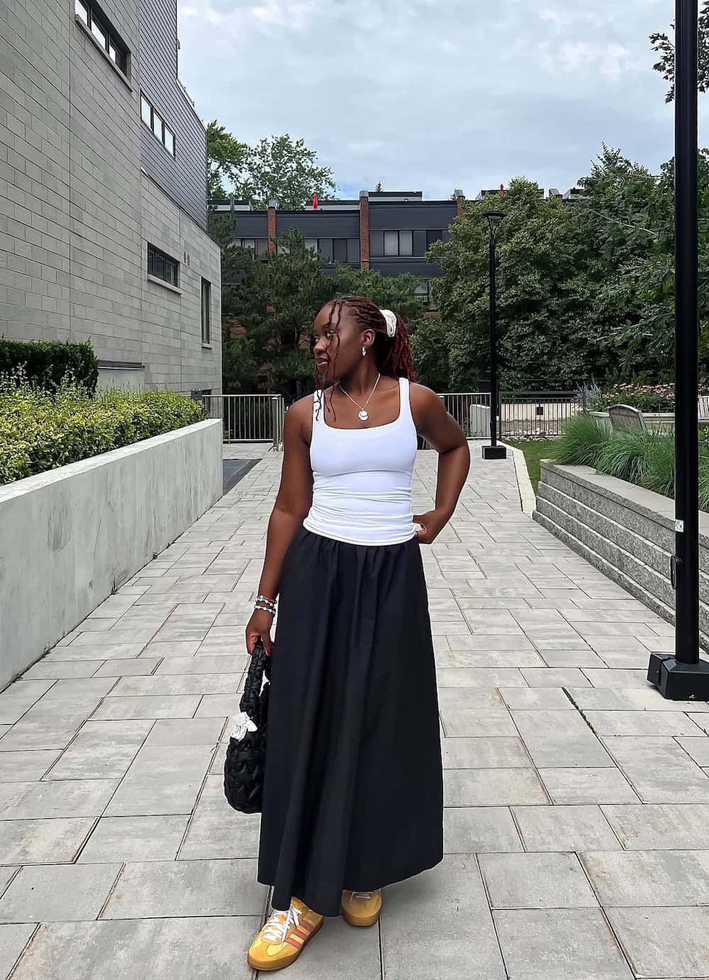 A Black Wide Leg Maxi Skirt With A Ribbed Tank Top A Black Wide Leg Maxi Skirt With A Ribbed Tank Top — Maxi Skirt Outfits