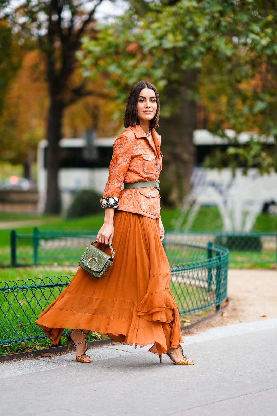 A Flowing Orange Maxi Skirt With A Cropped Jacket A Flowing Orange Maxi Skirt With A Cropped Jacket — Maxi Skirt Outfits