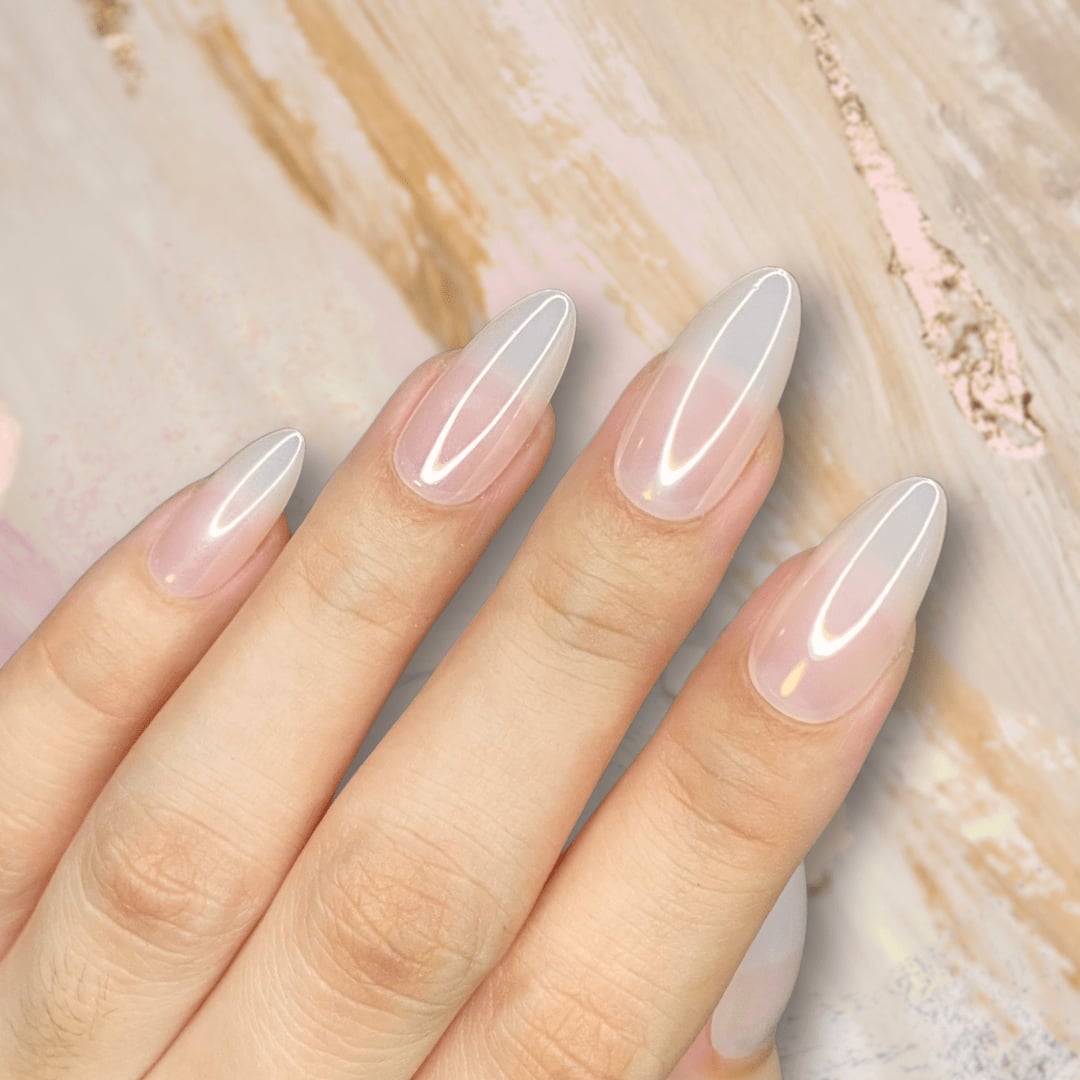 Milky White Pearlescent Chrome Almond Nails Milky White Pearlescent Chrome Almond Nails — Medium Nails
