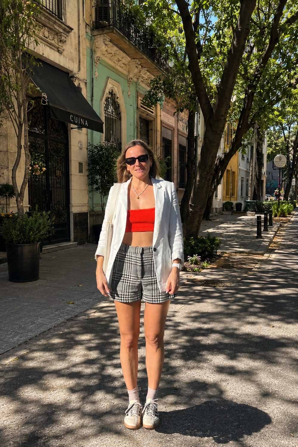 White Blazer Over Orange Crop Top with Houndstooth Shorts White Blazer Over Orange Crop Top with Houndstooth Shorts — Mexico Outfits