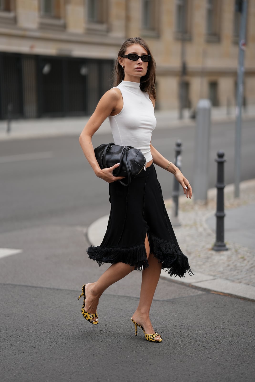 Black fringed midi skirt with white sleeveless top Black fringed midi skirt with white sleeveless top — Midi Skirt Outfits