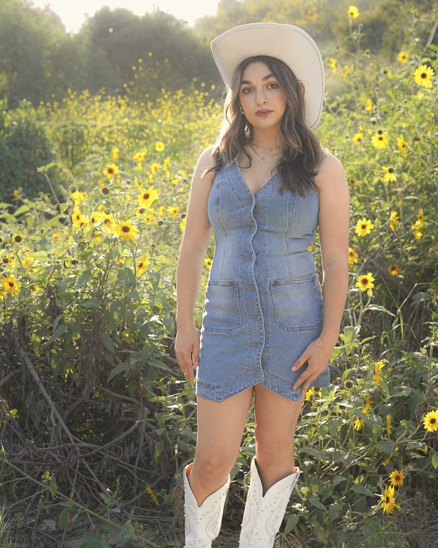 Denim mini dress with cowboy boot flair Denim mini dress with cowboy boot flair — Mini Dresses Outfit