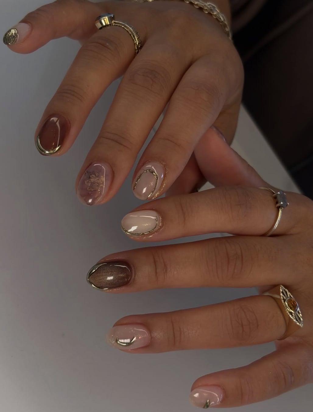 Short Oval Nude Beige Brown With Gold Foil Accents Short Oval Nude Beige Brown With Gold Foil Accents — Minimalist Nails