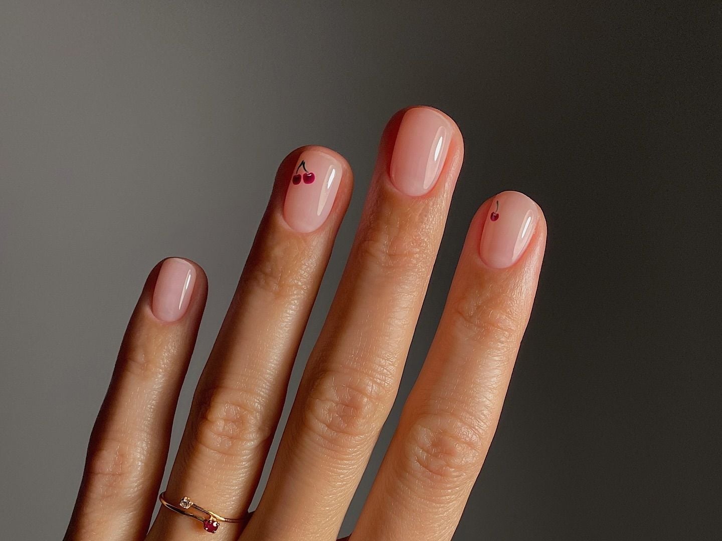 Short Oval Pink Nude With Tiny Red Cherries Short Oval Pink Nude With Tiny Red Cherries — Minimalist Nails