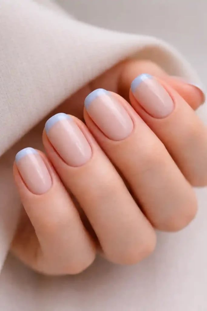 Sheer Nude Short Oval With Pale Blue French Tips Sheer Nude Short Oval With Pale Blue French Tips — Minimalist Nails