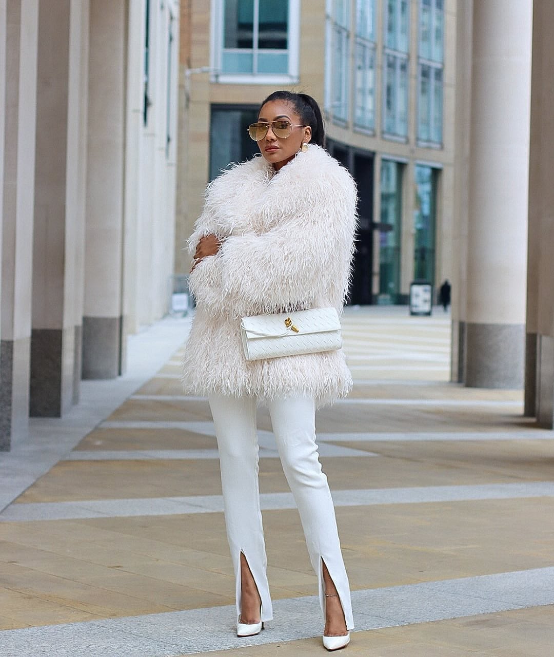 Shaggy white faux fur coat with white straight-leg pants Shaggy white faux fur coat with white straight-leg pants — Mob Wife Outfits