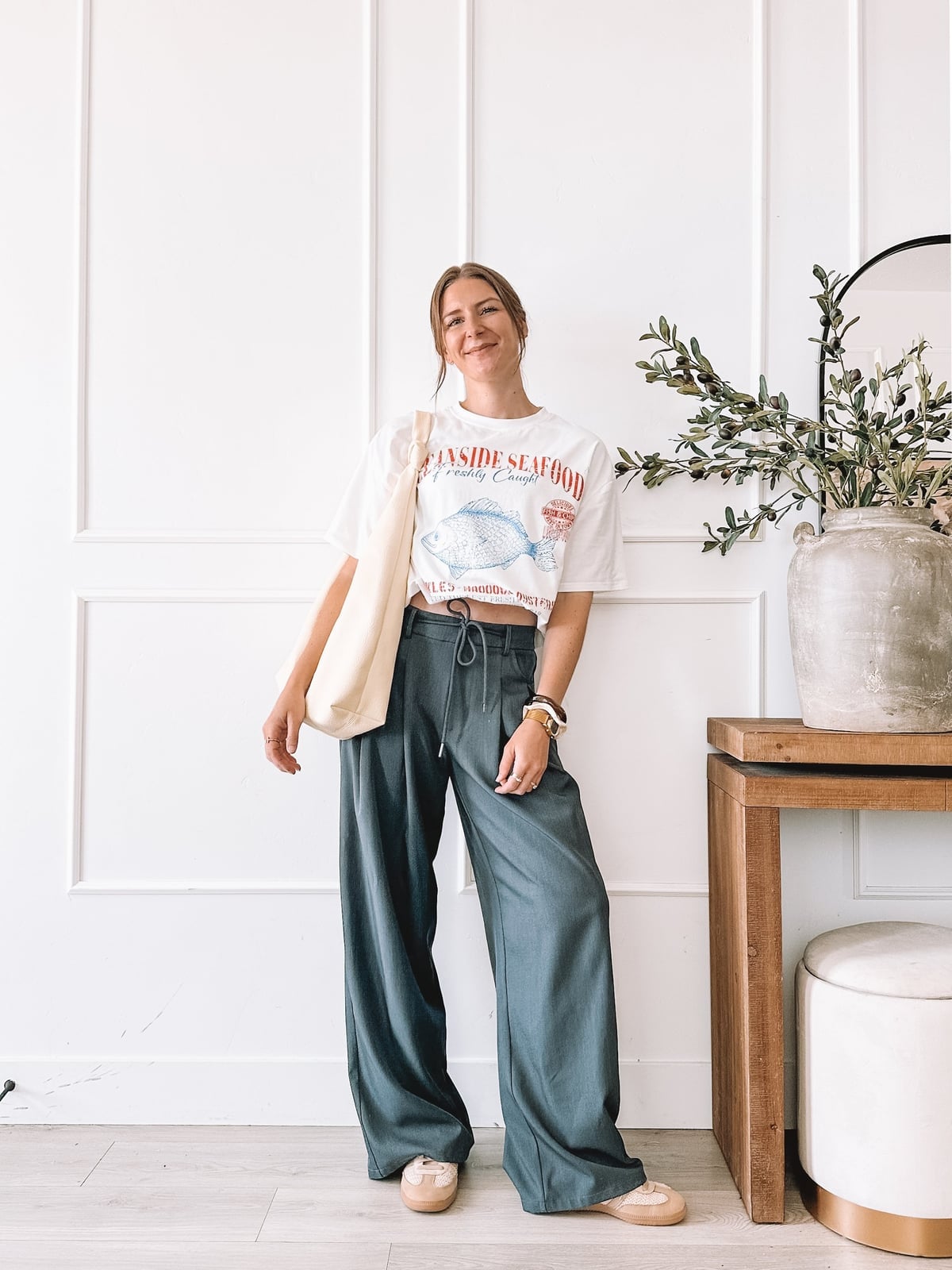 Graphic T-Shirt With Teal Trousers Graphic T-Shirt With Teal Trousers — Mom Outfits