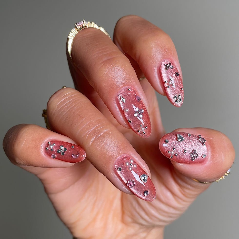 Medium Oval Nails with Rose Gold Shimmer and Mixed Gems Medium Oval Nails with Rose Gold Shimmer and Mixed Gems — Nails with Gems