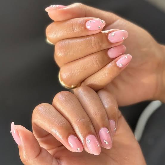 Medium Oval Nails with Milky Pink and Scattered Gems Medium Oval Nails with Milky Pink and Scattered Gems — Nails with Gems