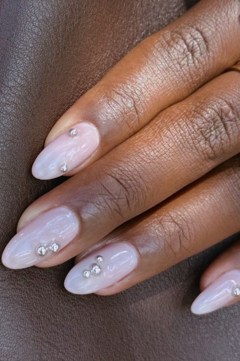Short Almond Nails with Milky White and Silver Gem Clusters Short Almond Nails with Milky White and Silver Gem Clusters — Nails with Gems