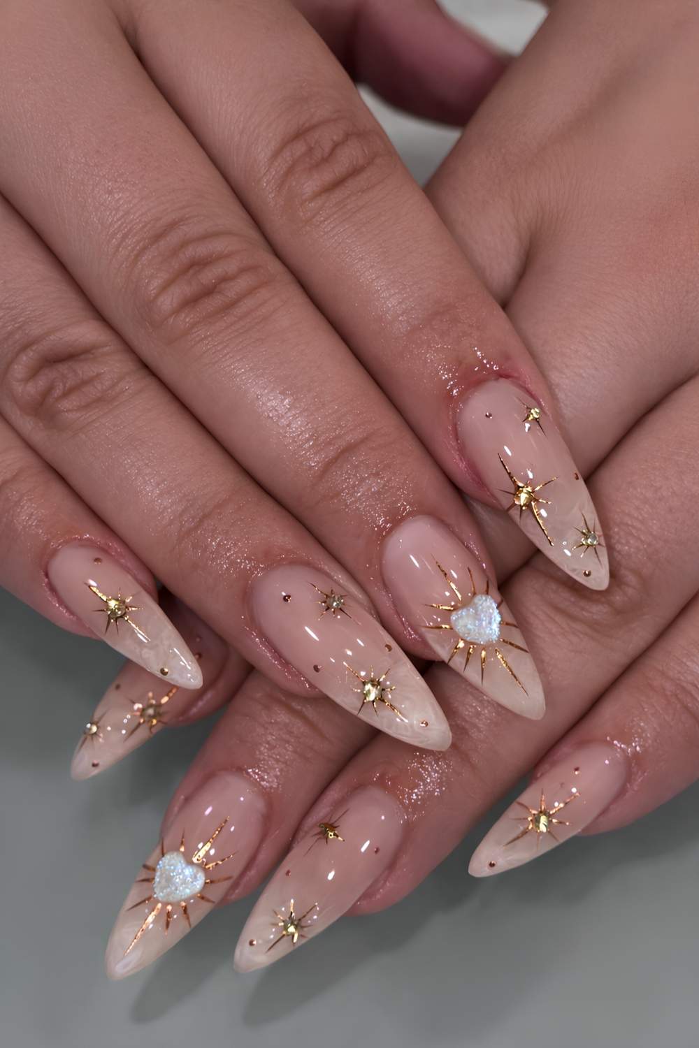 Stiletto Nails with Star and Heart Gem Accents Stiletto Nails with Star and Heart Gem Accents — Nails with Gems