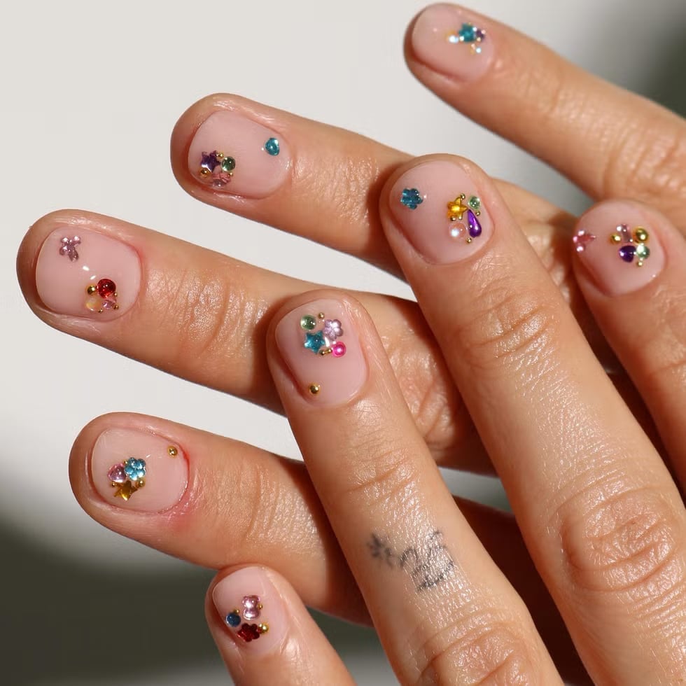Short Round Nails with Nude Base and Colorful Gem Clusters Short Round Nails with Nude Base and Colorful Gem Clusters — Nails with Gems