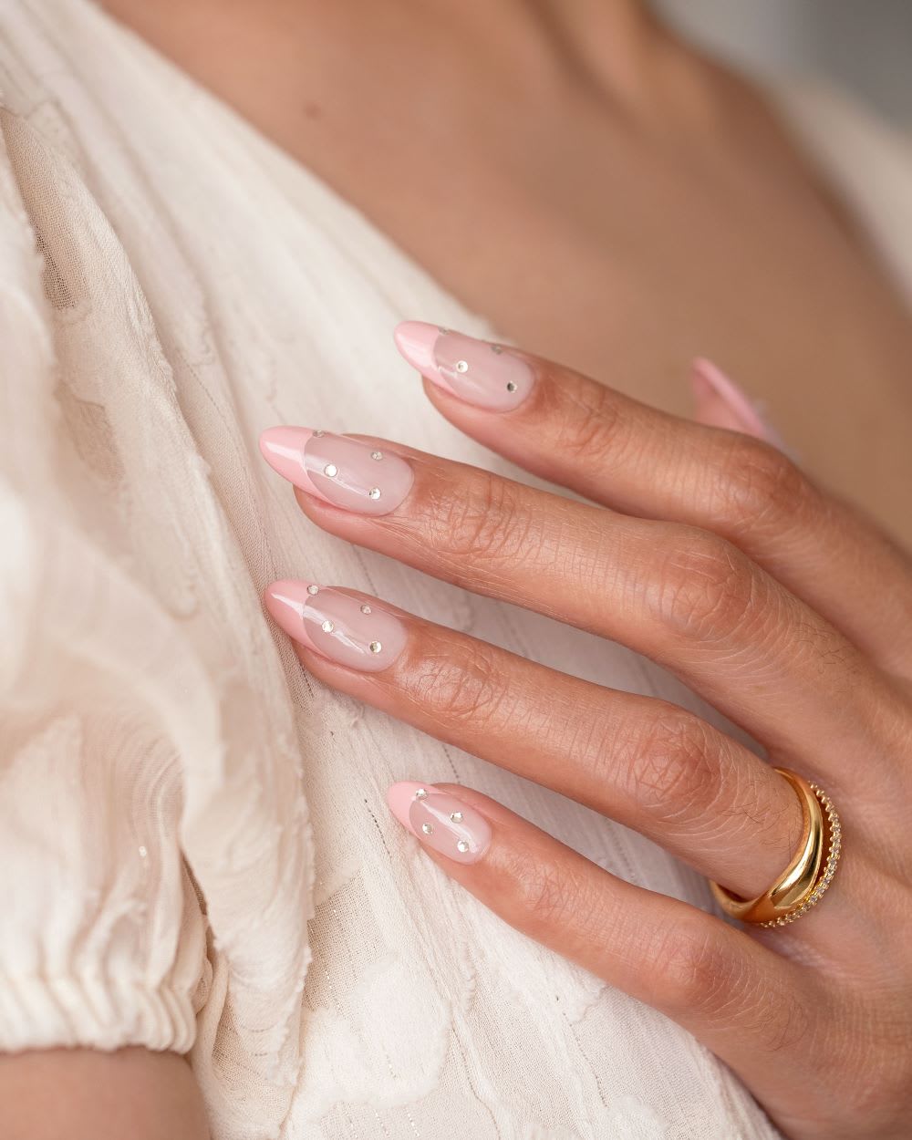 Almond Nails with Sheer Pink French Tips and Gem Accents Almond Nails with Sheer Pink French Tips and Gem Accents — Nails with Gems