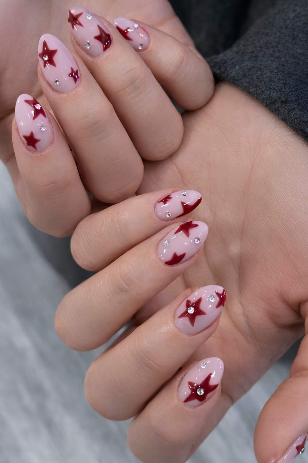 Medium Almond Nails with Red Stars and Silver Rhinestones Medium Almond Nails with Red Stars and Silver Rhinestones — Nails with Gems