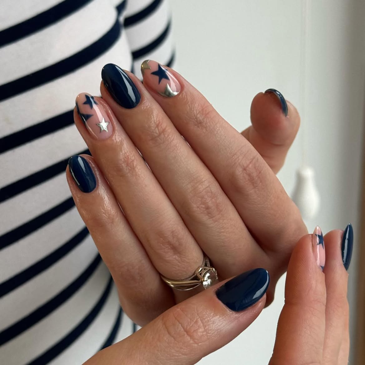 Navy Blue Oval Nails with Star Accents