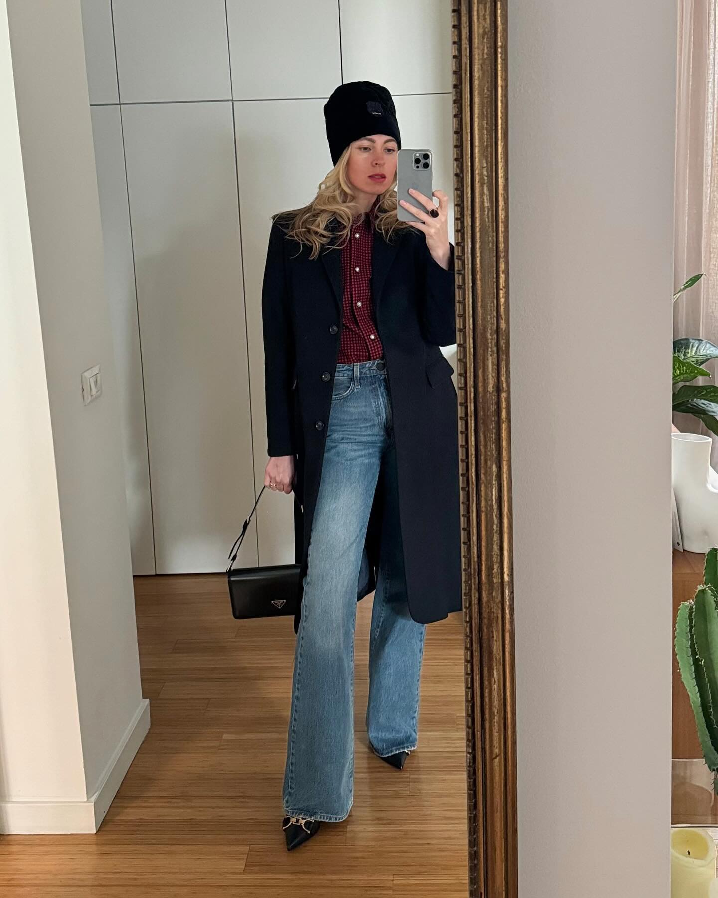 Navy Coat Over Red Plaid Shirt And Flares