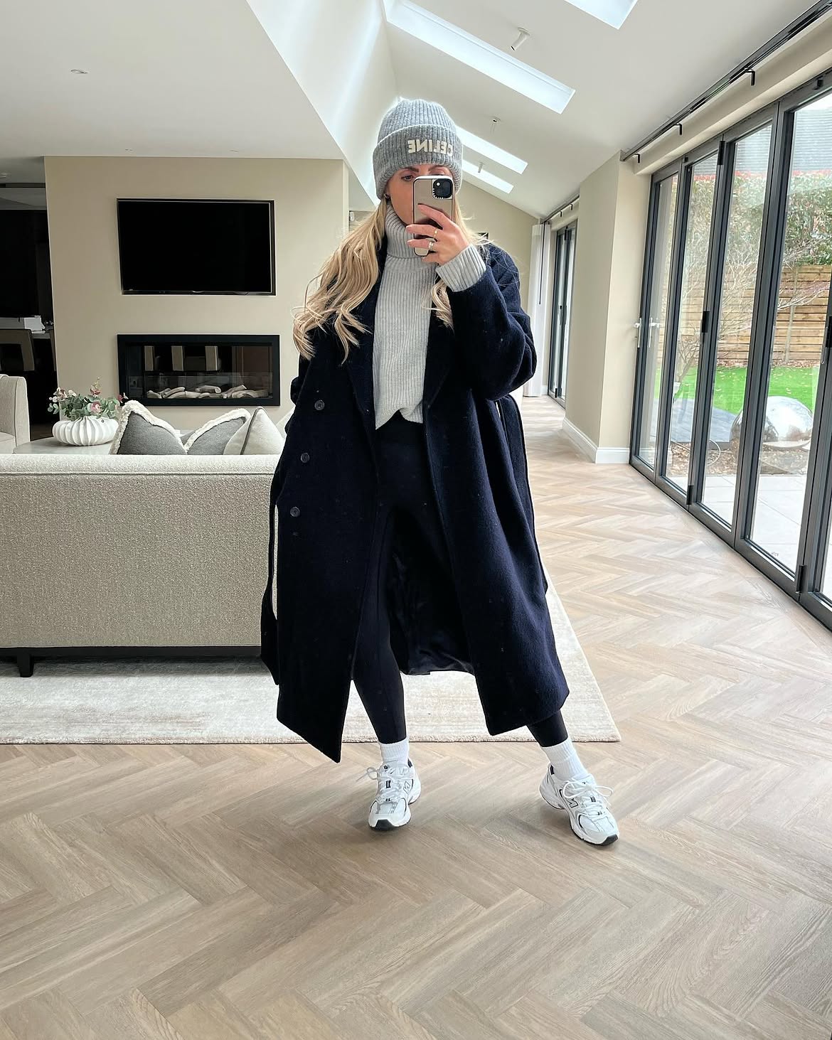 Navy Wool Coat Over Light Grey Knit And Black Leggings