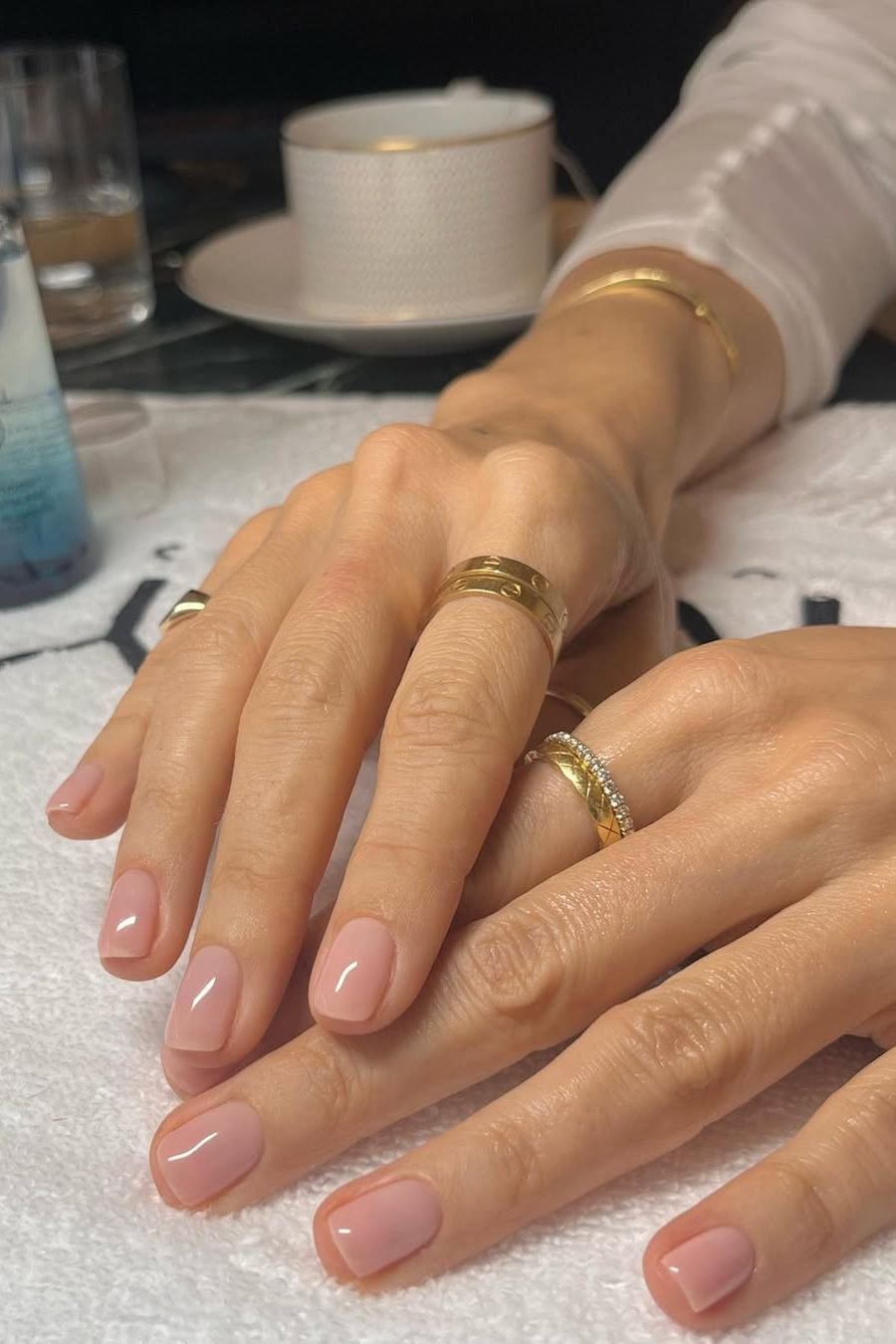 Short Almond Sheer Milky Pink Glossy Nails, Close-Up Take Short Almond Sheer Milky Pink Glossy Nails, Close-Up Take — Neutral Nails