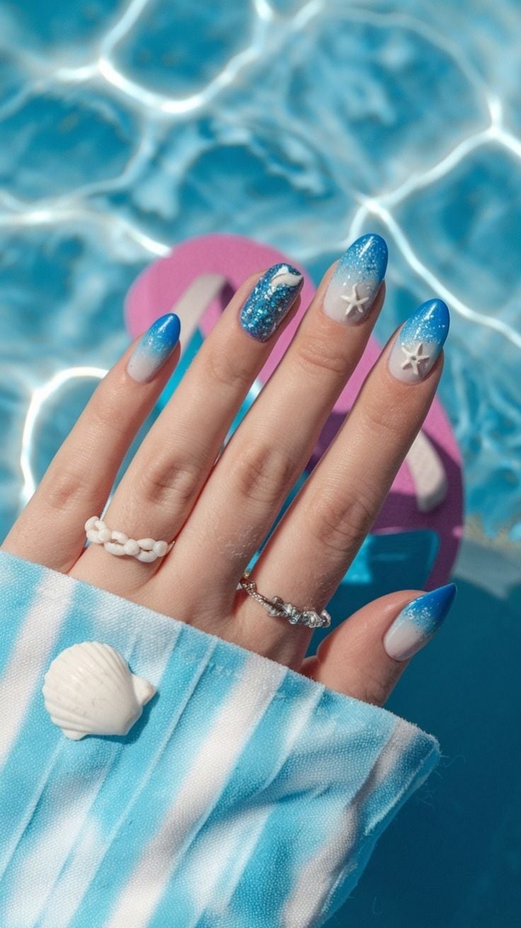 Sparkling Blue Gradient Starfish Medium Almond Nails Sparkling Blue Gradient Starfish Medium Almond Nails — Ocean Nails