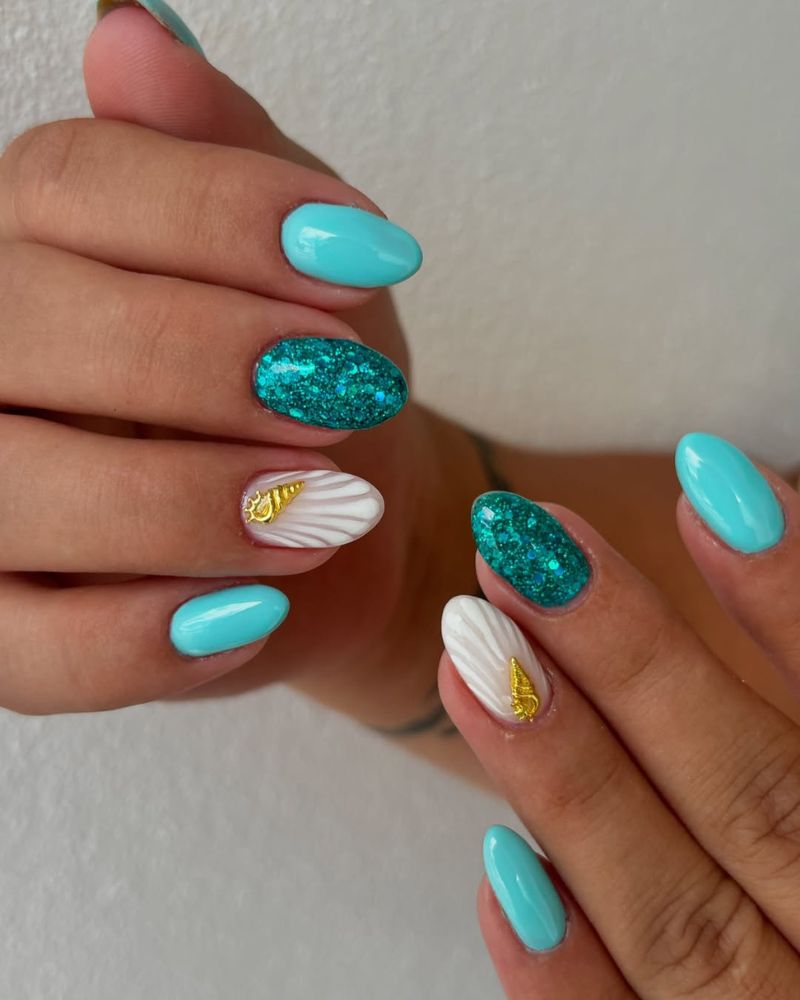 Teal Glitter and 3D Seashell Medium Oval Nails Teal Glitter and 3D Seashell Medium Oval Nails — Ocean Nails