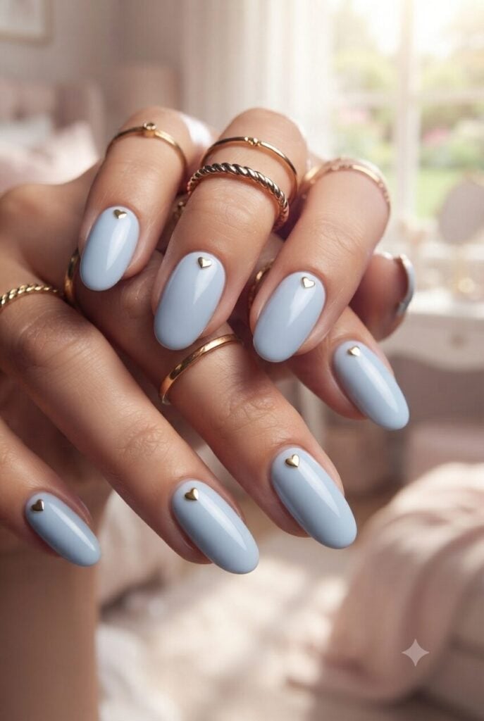 Light Blue Short Almond Nails With Gold Hearts Light Blue Short Almond Nails With Gold Hearts — One Color Nails
