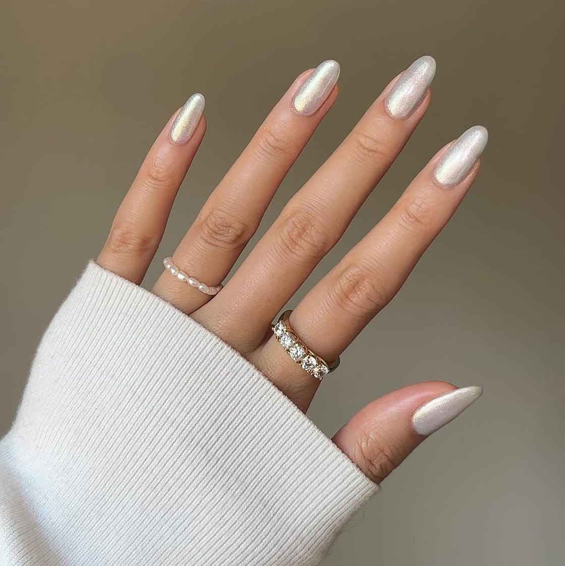 Pale Iridescent White Milky Chrome Medium Almond Nails Pale Iridescent White Milky Chrome Medium Almond Nails — One Color Nails