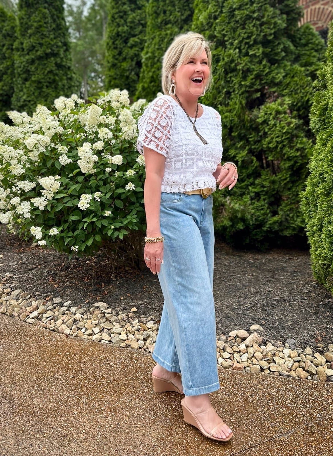 White lace top with light blue wide-leg jeans White lace top with light blue wide-leg jeans — Outfits for Women Over 50