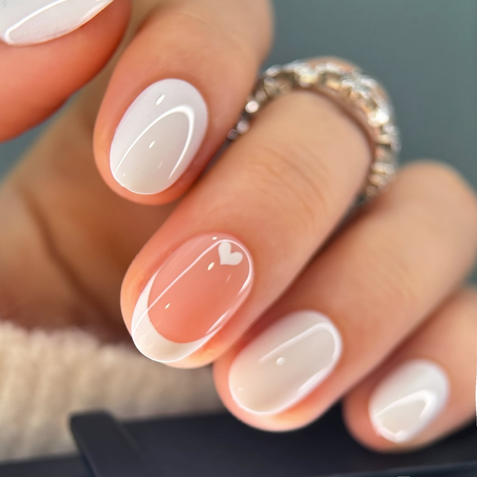 Nude French Oval Nails With Heart Accent Nude French Oval Nails With Heart Accent