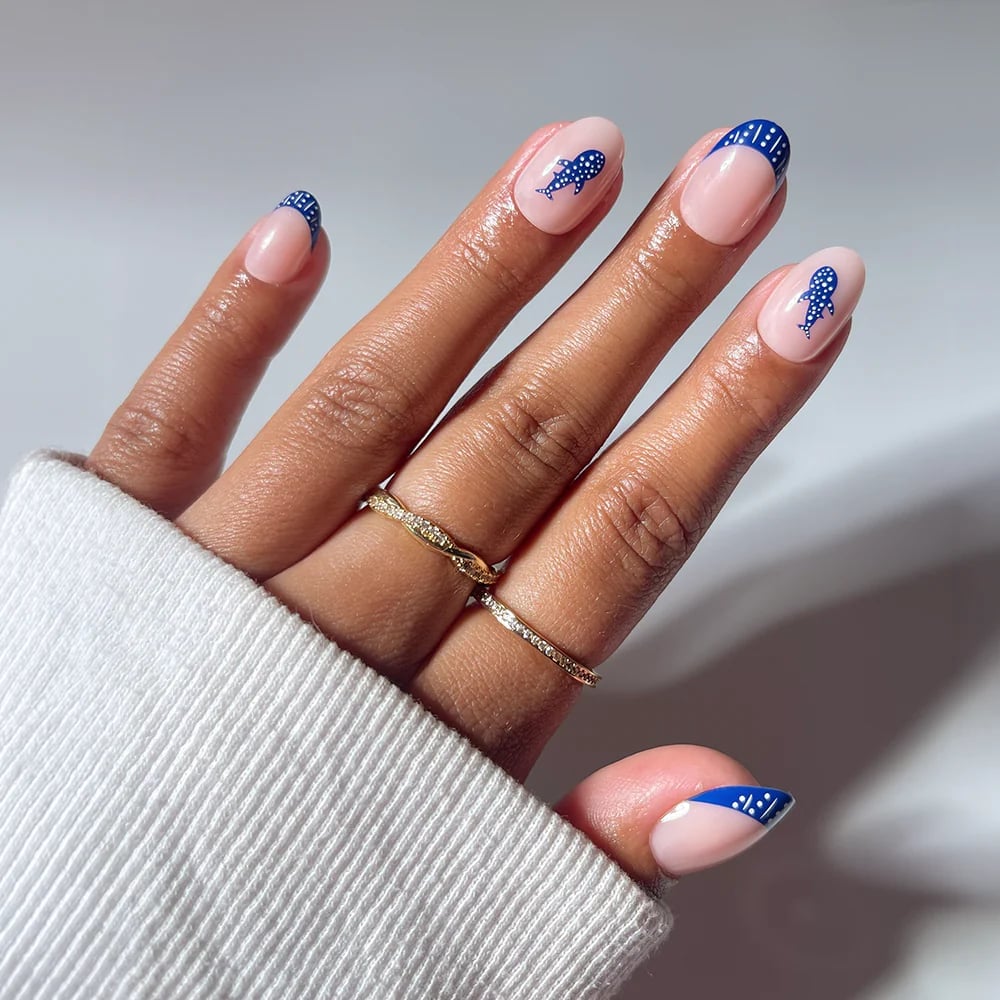 Nude Oval Nails With Blue Fish Motif Nude Oval Nails With Blue Fish Motif