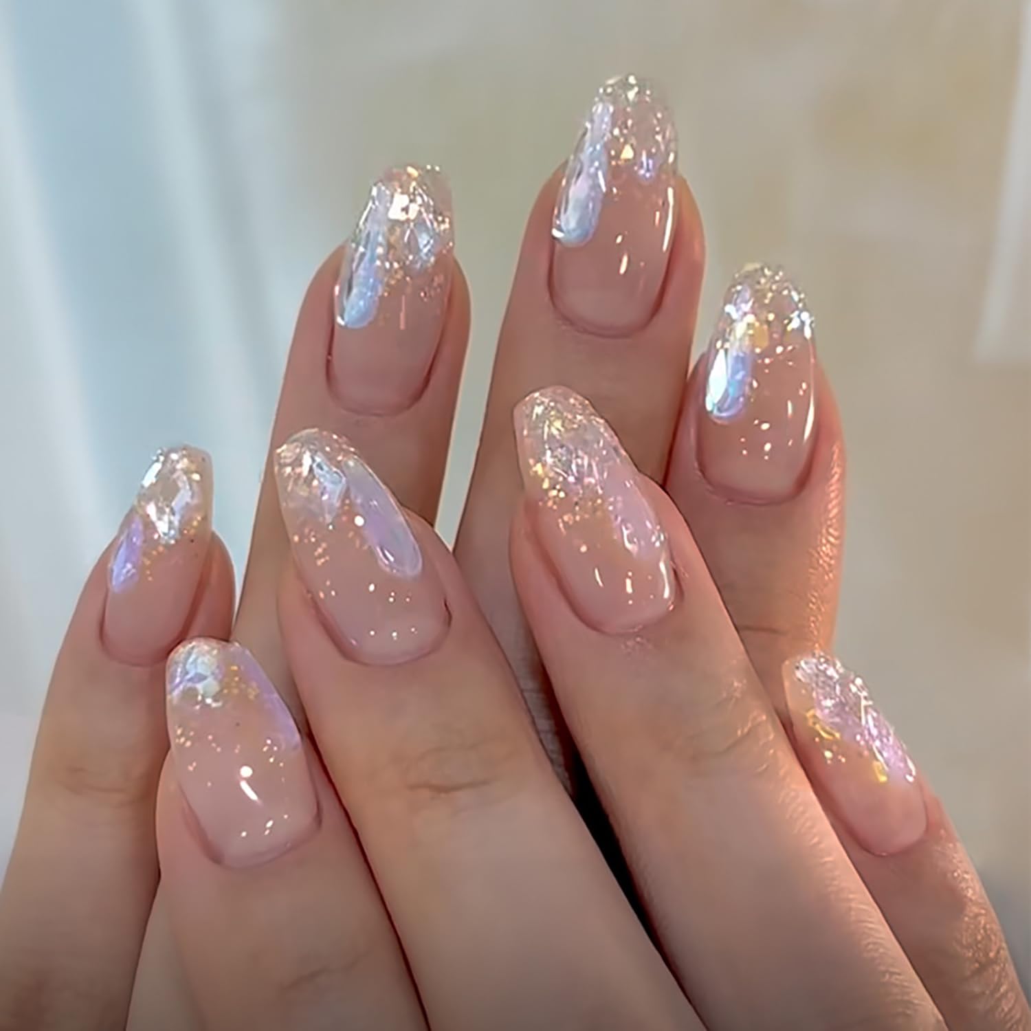 Sheer Nude Oval Nails With Iridescent Flakes Sheer Nude Oval Nails With Iridescent Flakes