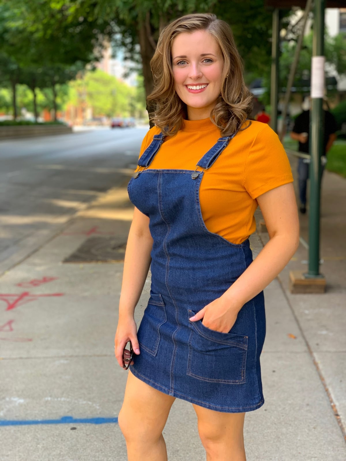 Blue denim overall dress with an orange t-shirt Blue denim overall dress with an orange t-shirt — Overalls Outfits