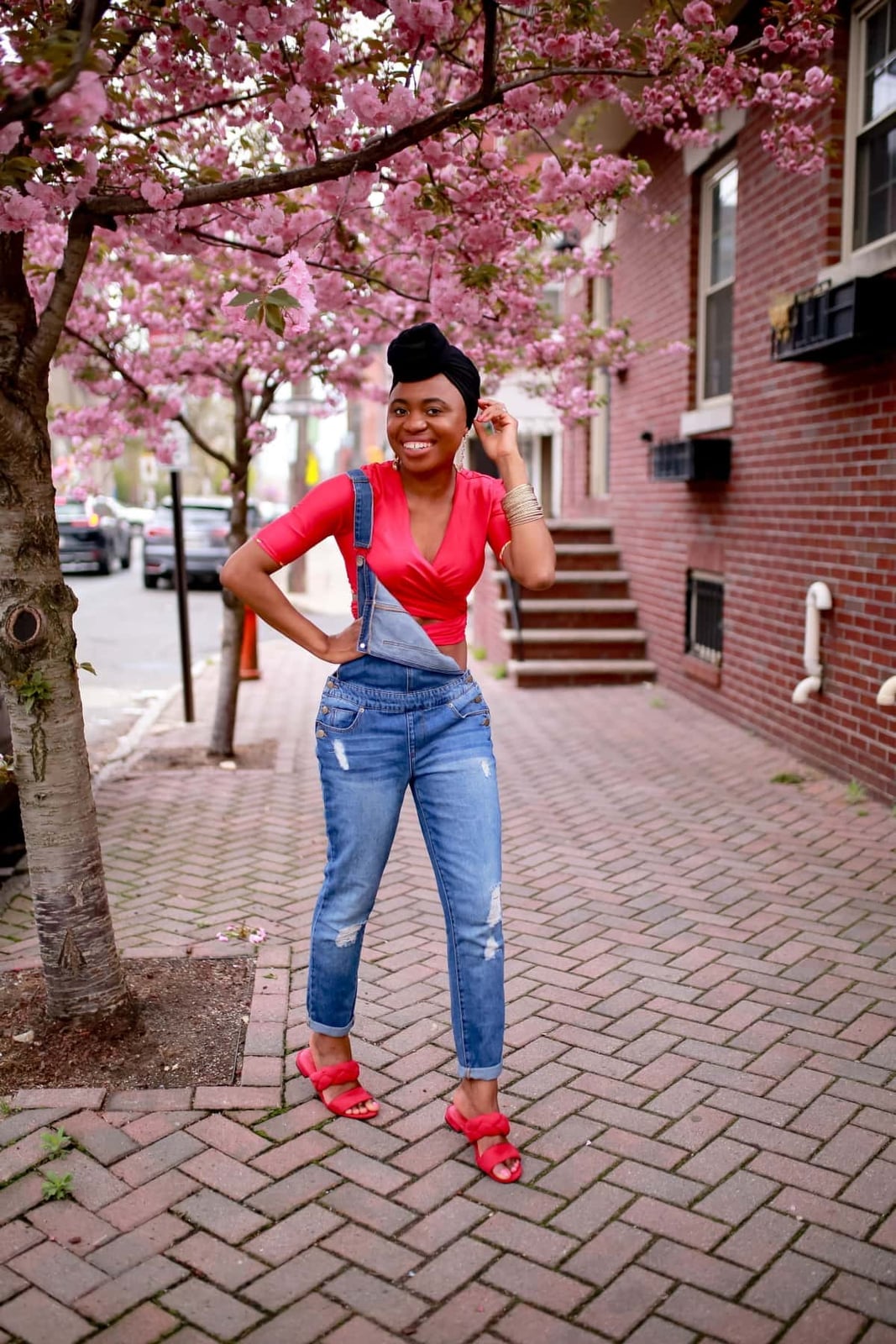 Distressed skinny leg overalls with a red wrap top Distressed skinny leg overalls with a red wrap top — Overalls Outfits