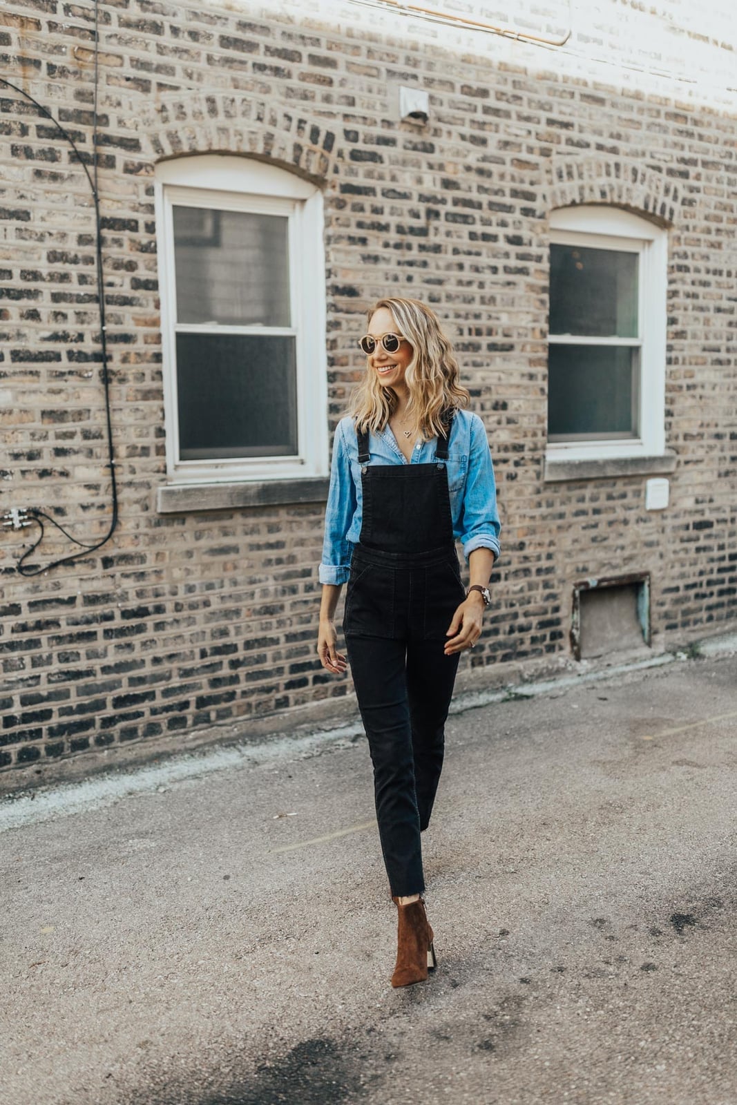 Black denim overalls with a blue button-down shirt Black denim overalls with a blue button-down shirt — Overalls Outfits