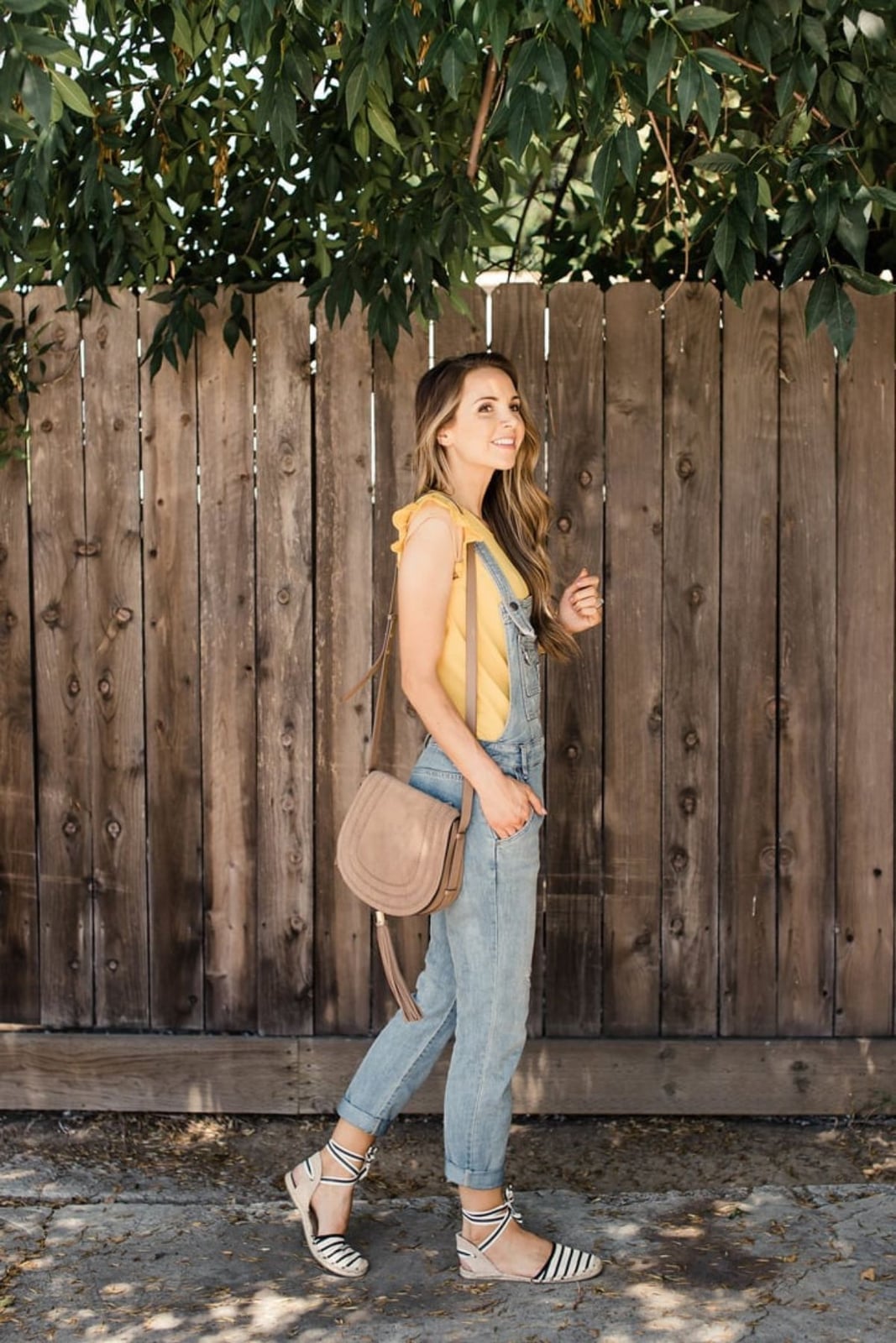 Light wash overalls with yellow top and striped flats Light wash overalls with yellow top and striped flats — Overalls Outfits