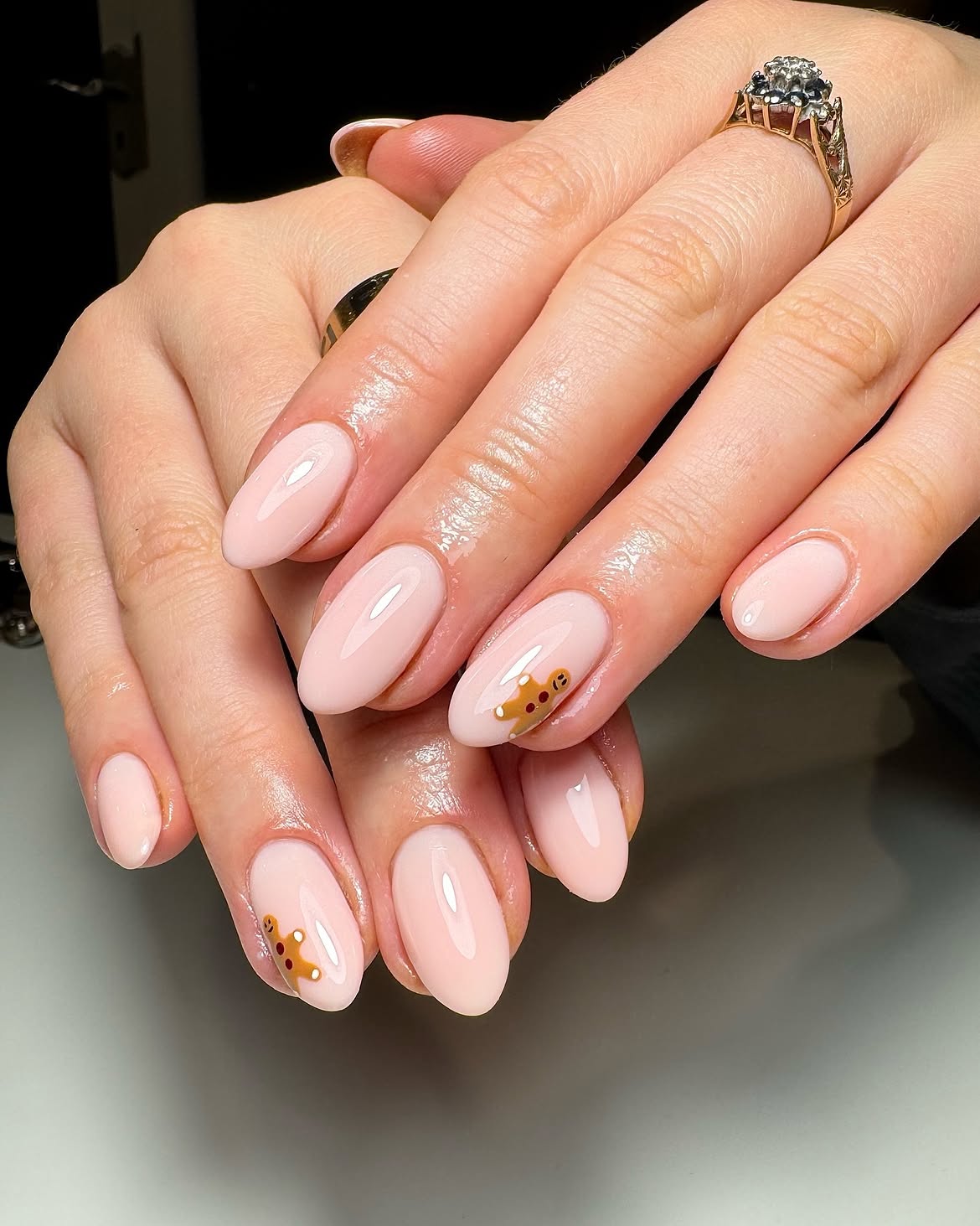 Pale Pink Almond Nails with Gingerbread Man Art