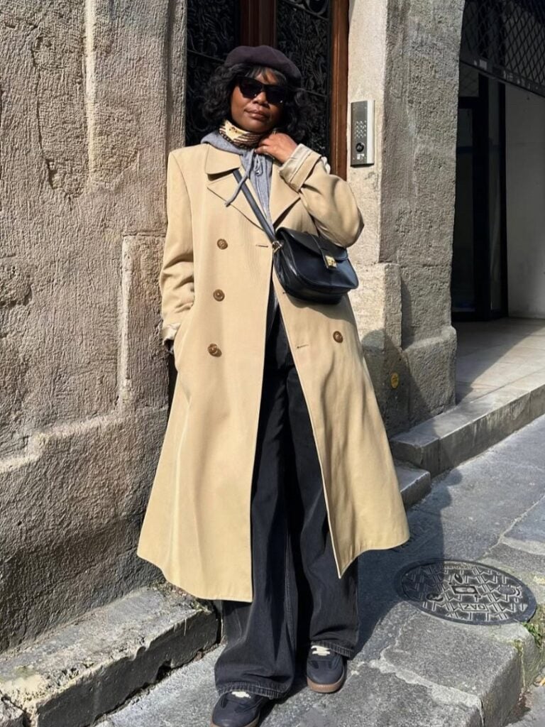 Beige trench coat over gray hoodie and jeans Beige trench coat over gray hoodie and jeans — Parisian Style